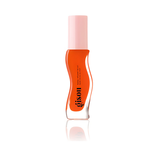 Gisou Honey Infused Lip Oil in Mango Passion Fruit for glossy, hydrated lips with a tropical scent and sheer coral shade. Shop Now at VIMP BEAUTY.






