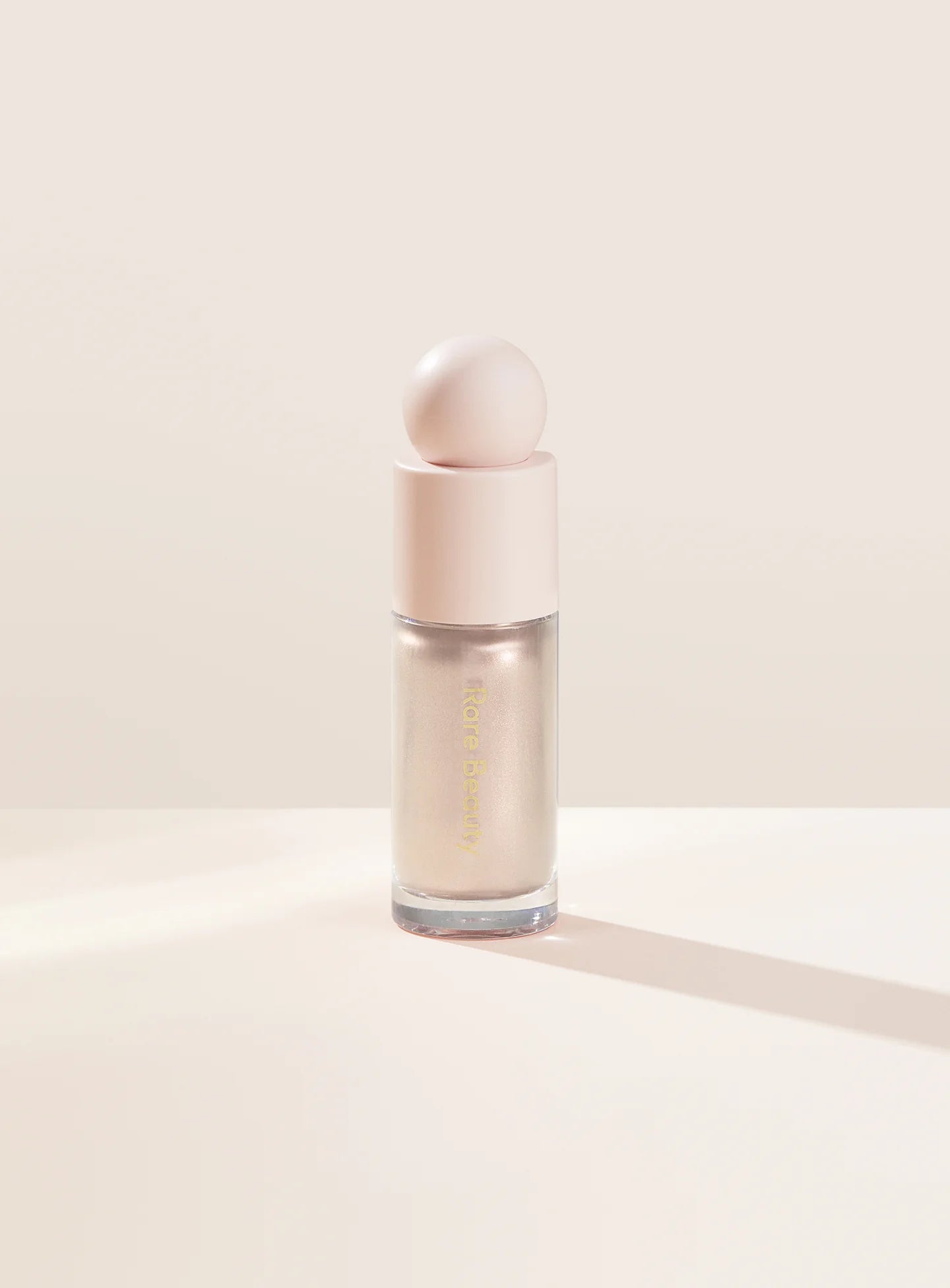 Positive Light Liquid Luminizer highlighter for a dewy, radiant glow on all skin tones. Shop Now at VIMP BEAUTY
