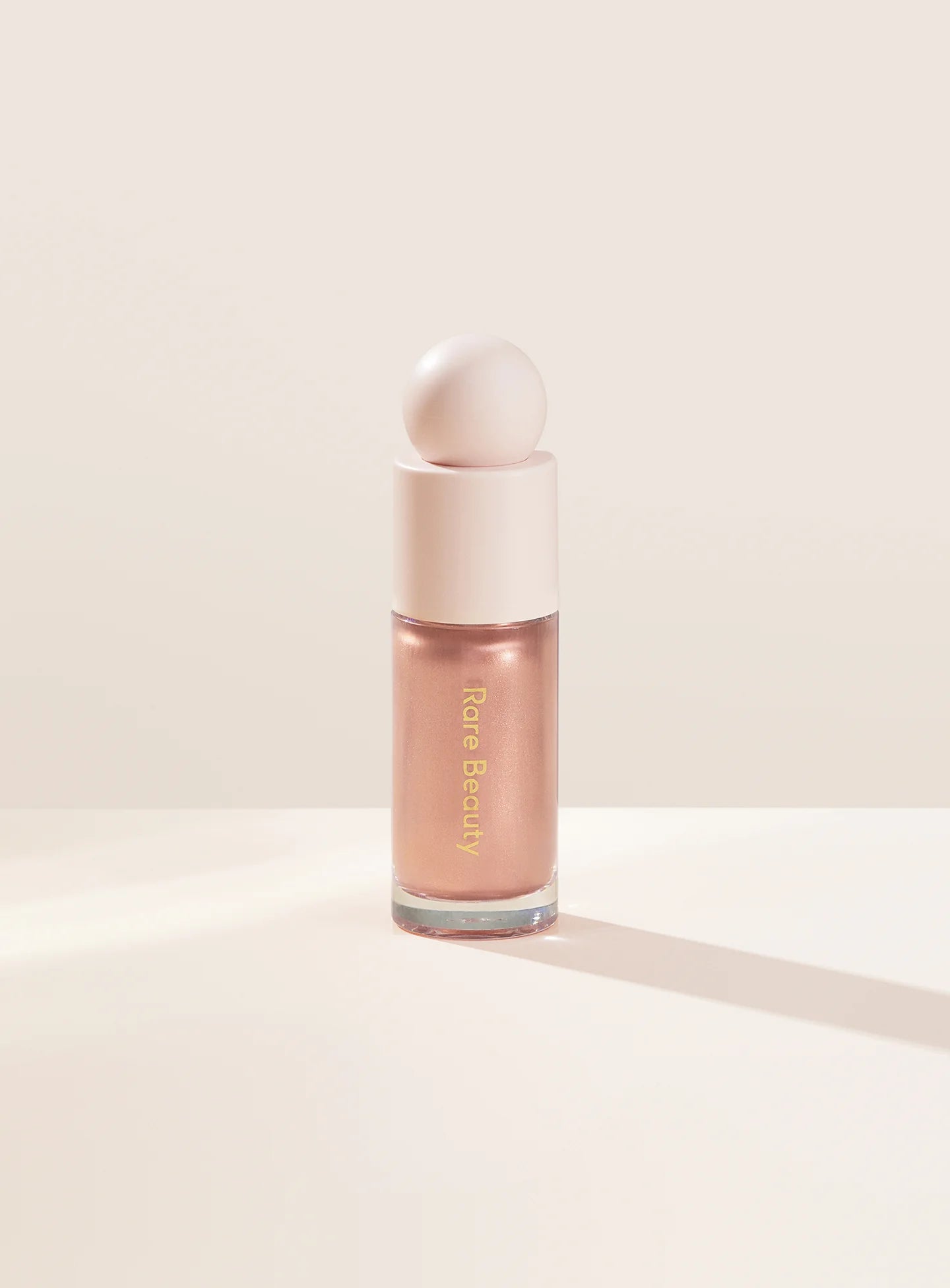 Positive Light Liquid Luminizer highlighter for a dewy, radiant glow on all skin tones. Shop Now at VIMP BEAUTY
