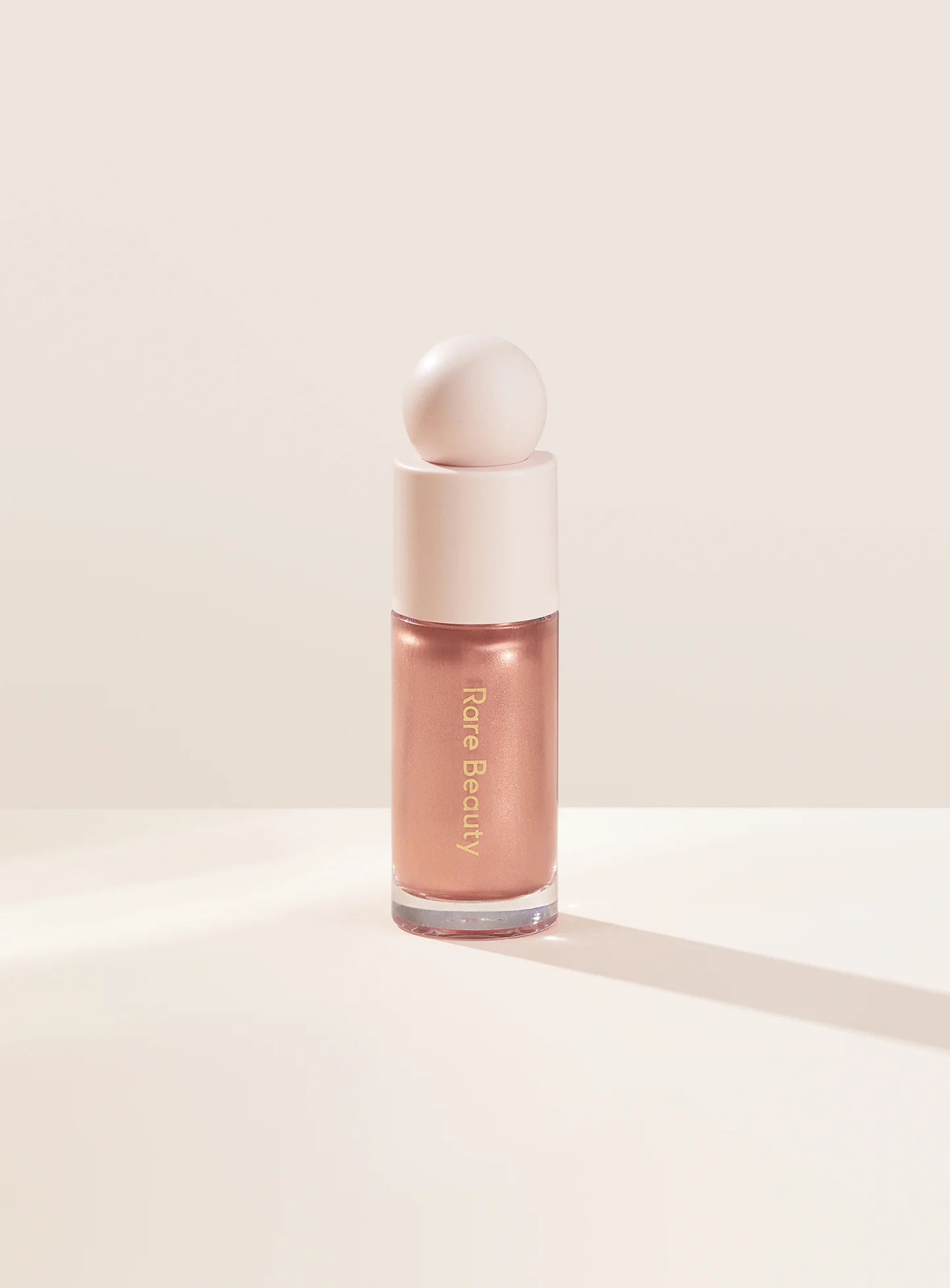 Positive Light Liquid Luminizer highlighter for a dewy, radiant glow on all skin tones. Shop Now at VIMP BEAUTY
